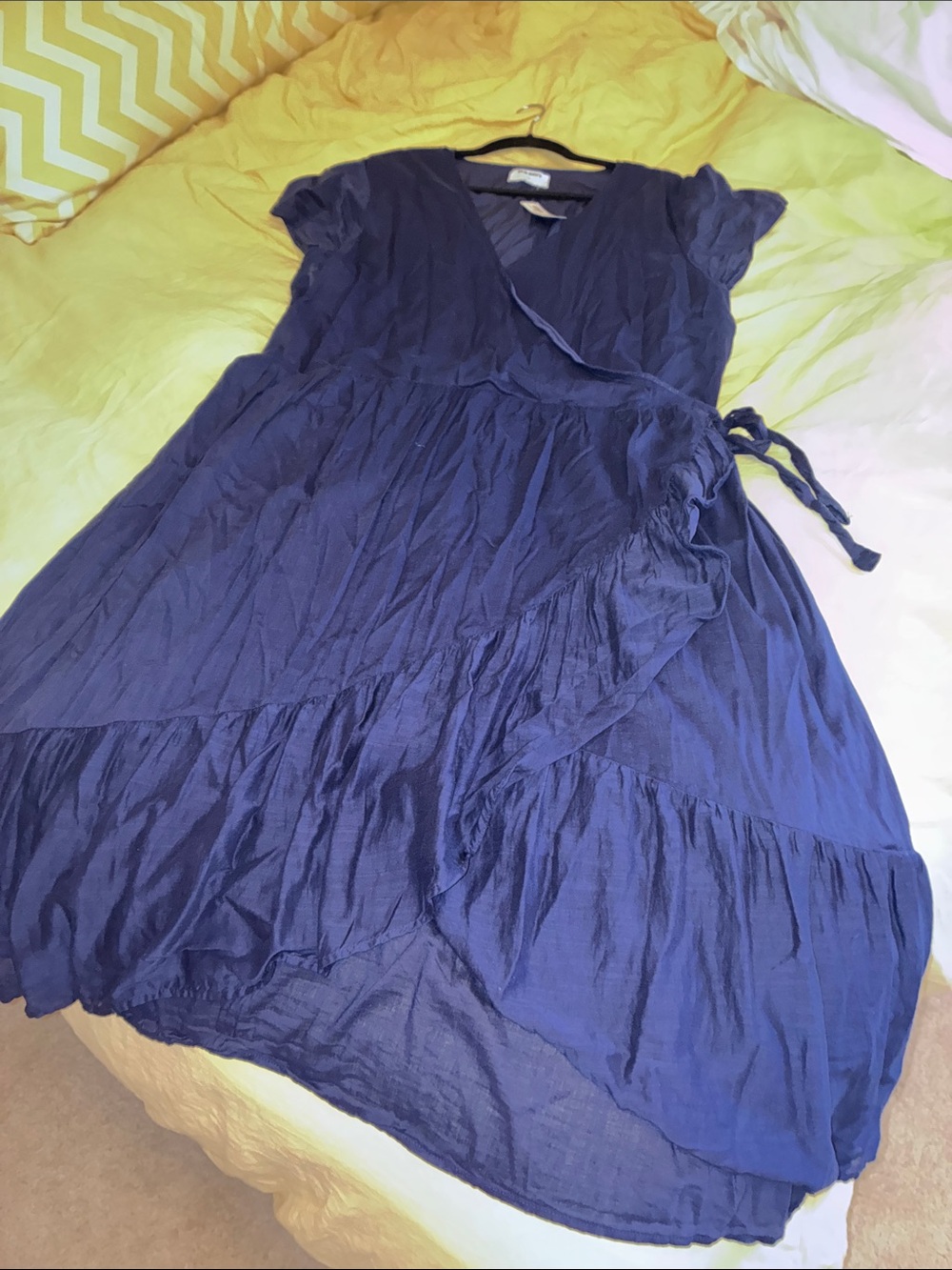 Navy flowy faux wrap dress with short sleeves.